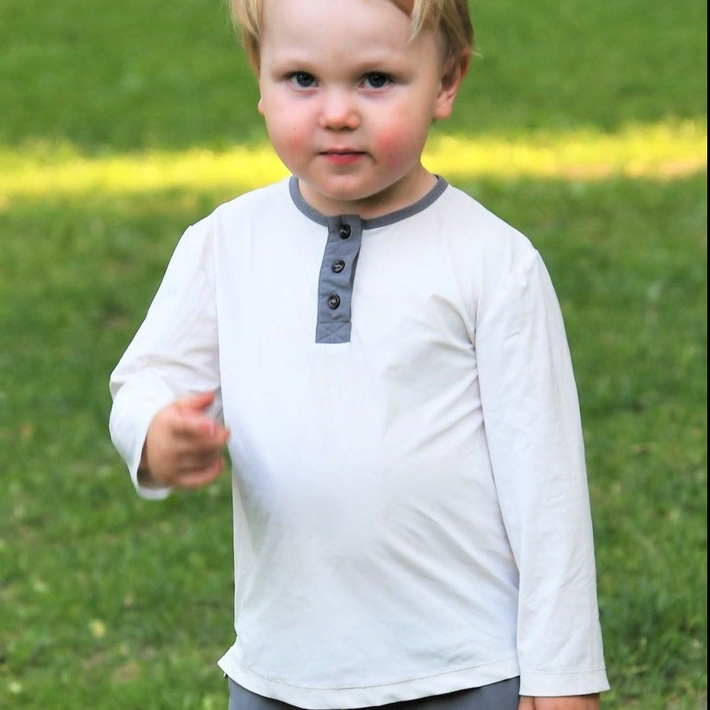 uv kläder för barn - fina stiliga uv kläder - Eleganse möter Solskydd: Den Ultimata UV-Toppen med UPF50